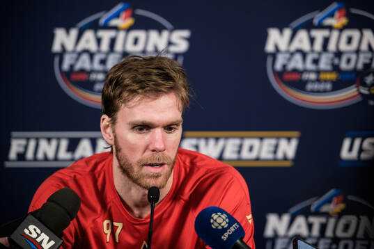 Connor McDavid of Canada is being interviewed by media