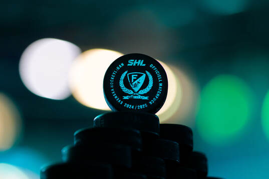 En puck i ishallen