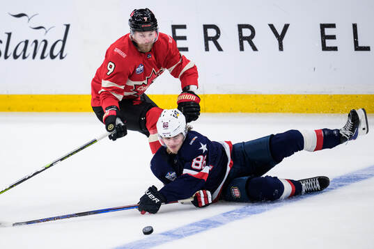 Sam Bennett of Canada and Jack Hughes of USA