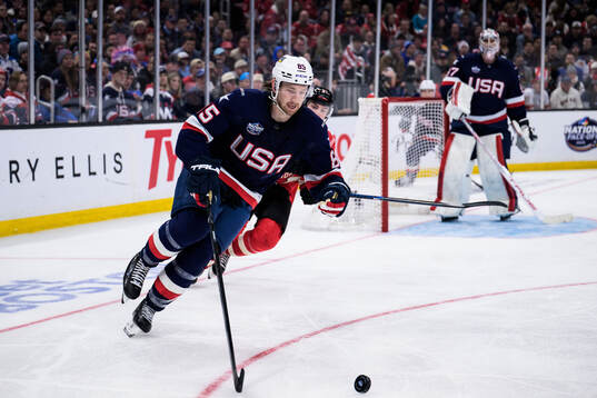 Jake Sanderson of USA and Brayden Point of Canada