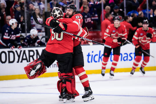 Goaltender Jordan Binnington and Drew Doughty of Canada