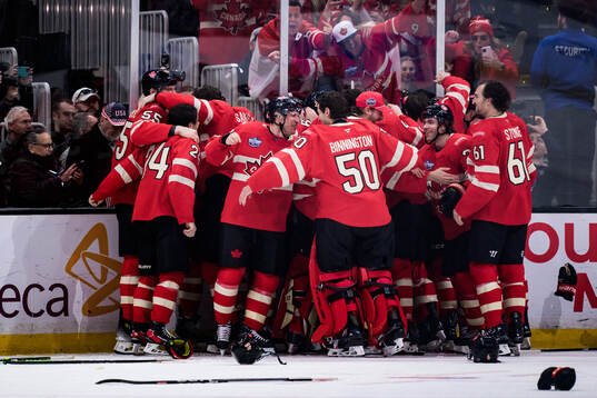 Players of Canada celebrate