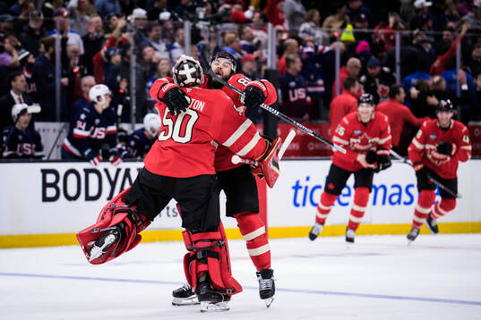 Goaltender Jordan Binnington and Drew Doughty of Canada
