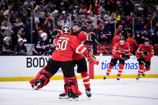 Goaltender Jordan Binnington and Drew Doughty of Canada
