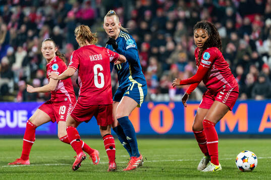 Stina Blackstenius of Sweden against Josefine Hasbo and