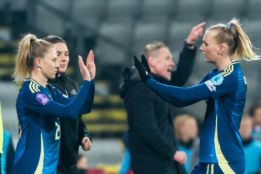 Stina Blackstenius changes with Rebecka Blomqvist of Sweden