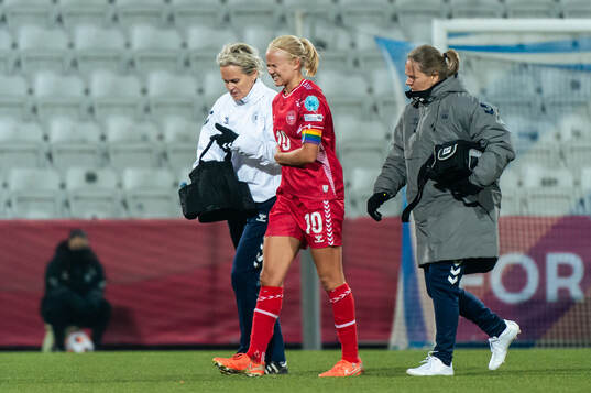 Katrine Veje of Denmark in pain