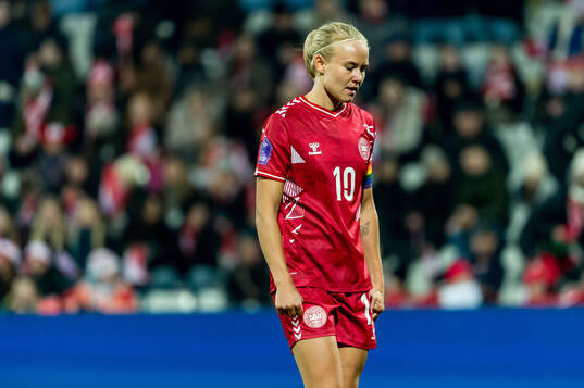 Pernille Harder of Denmark looks dejected
