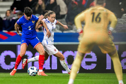 Elisa De Almeida of France and Guro Reiten of Norway