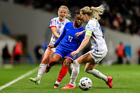 Emilie Woldvik and Ada Hegerberg of Norway against Sandy