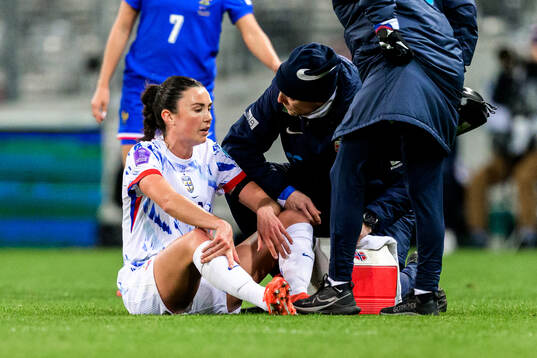 Ingrid Syrstad Engen of Norway receives medical attention