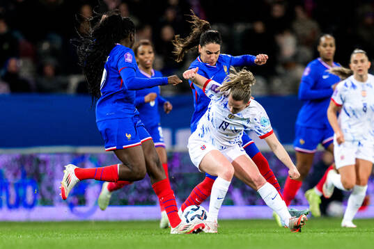 Amel Majri of France and Elisabeth Terland of Norway