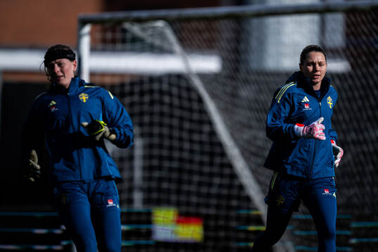 Goalkeeper Tove Enblom and goalkeeper Jennifer Falk of the