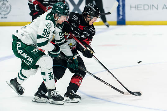 Färjestads Marian Studenic och Malmö Redhawks Henrik