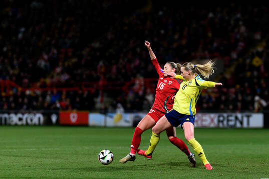 Charlie Estcourt of Wales and Stina Blackstenius of Sweden