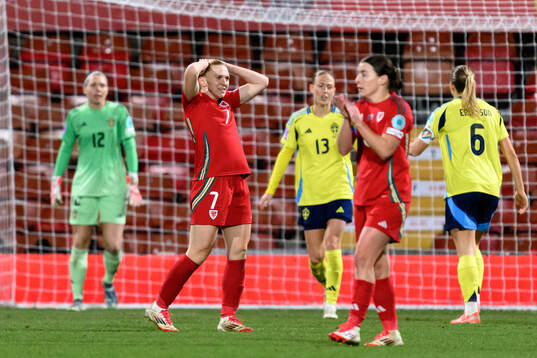 Ceri Holland of Wales looks dejected