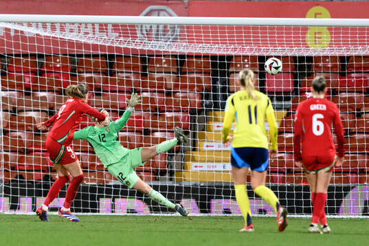 Kayleigh Barton of Wales scores 1-1