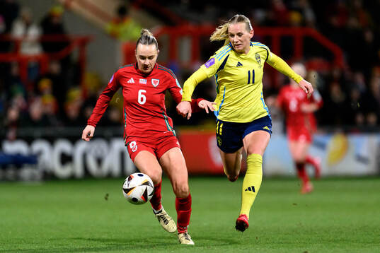 Josie Green of Wales and Stina Blackstenius of Sweden