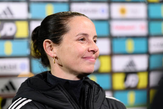 Head coach Rhian Wilkinson of Wales is being interviewed