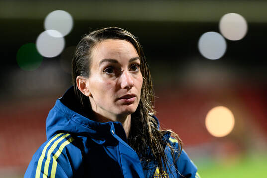 Kosovare Asllani of Sweden is being interviewed