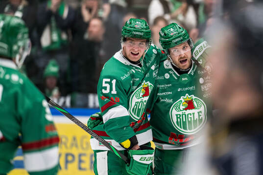 Rögles Calle Själin och Linus Sandin jublar