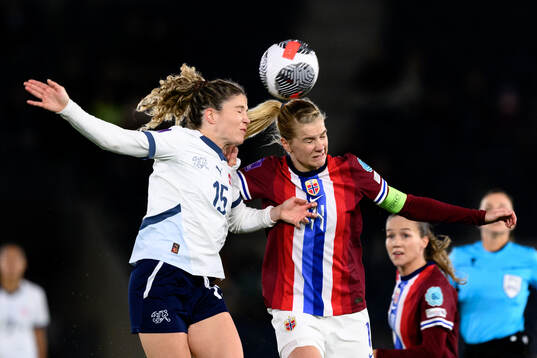Luana Buhler of Switzerland and Ada Hegerberg of Norway