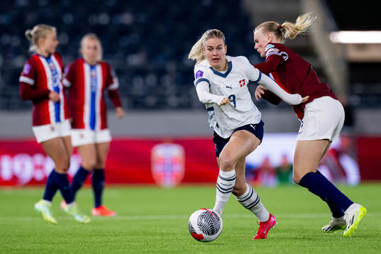 Nadine Riesen of Switzerland and Karina Sævik of Norway