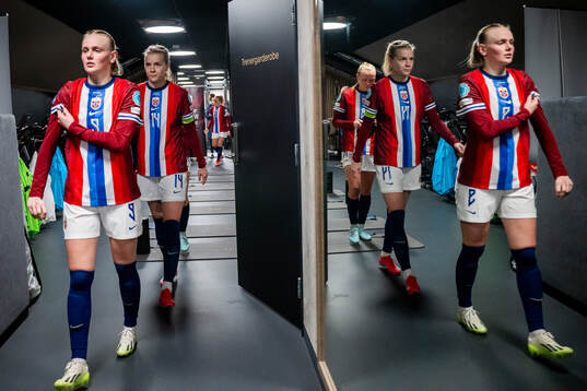 Karina Sævik and Ada Hegerberg of Norway at half-time