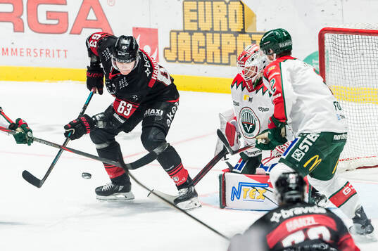 Malmö Redhawks Fredrik Händemark och Frölundas Lars