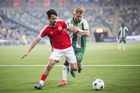 Kalmars Arash Motaraghebjafarpour och Hammarbys Simon Strand