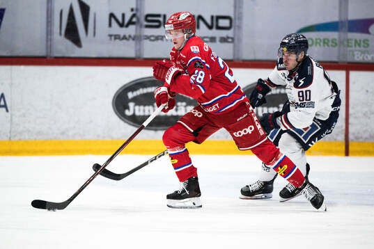 Timrås Simon Forsmark och Linköpings Lance Bouma