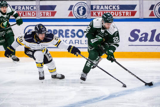 HV71s Andre Petersson och Färjestads Per Åslund