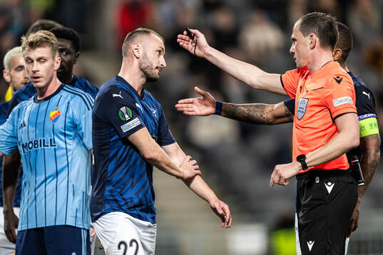 Muamer Tankovic of Pafos reacts against referee Sebastian