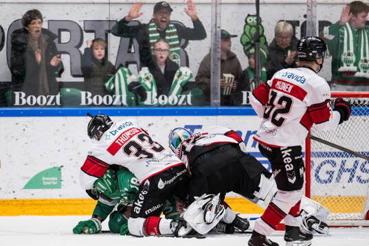 Malmö Redhawks Lassi Thomson och målvakt Daniel