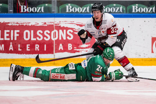Malmö Redhawks Lassi Thomson och Rögles Henry Bowlby