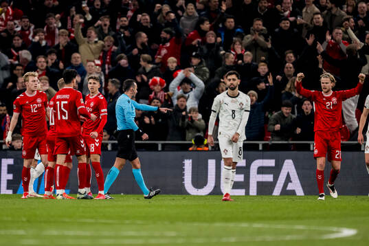 Referee Irfan Peljto awards penalty to Denmark