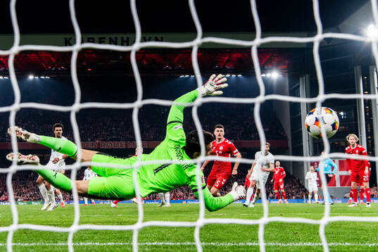 Goalkeeper Diogo Costa of Portugal makes a save