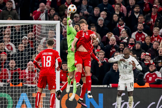 Goalkeeper Diogo Costa of Portugal and Jannik Vestergaard