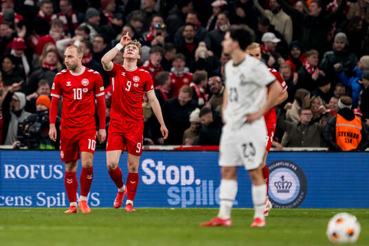 Rasmus Højlund of Denmark celebrates