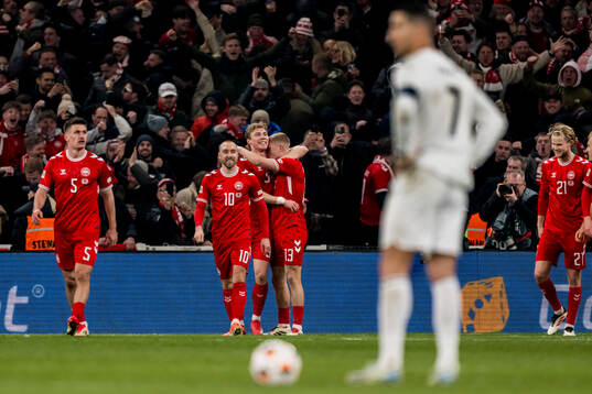 Rasmus Højlund of Denmark celebrates