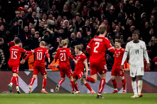 Rasmus Højlund of Denmark celebrates