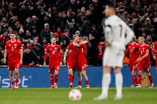 Rasmus Højlund of Denmark celebrates