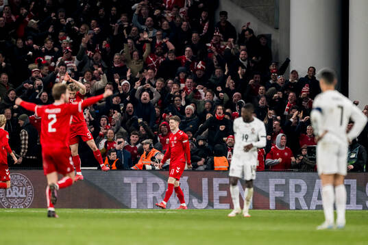 Rasmus Højlund of Denmark celebrates