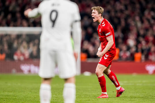 Rasmus Højlund of Denmark celebrates