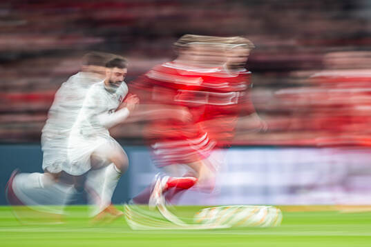 Bruno Fernandes of Portugal and Morten Hjulmand of Denmark