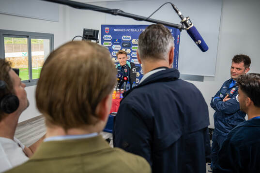 Martin Ødegaard and press officer Morten Morisbak