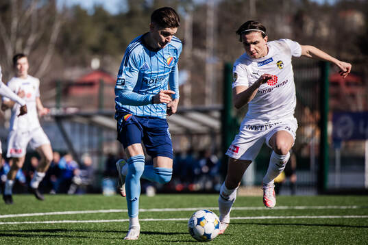 Djurgårdens Nino Zugelj och KuPS Arttu Lötjönen