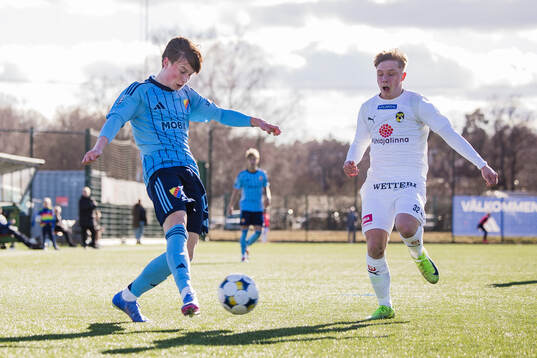 Djurgårdens Alexander Andersson och KuPS Rasmus Tikkanen