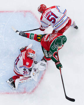 Timrås Anton Lander och målvakt Tim Juel mot Frölundas