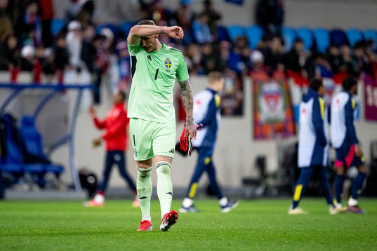Goalkeeper Robin Olsen of Sweden looks dejected